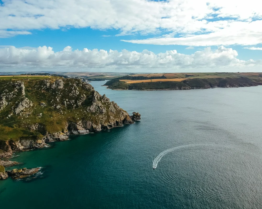 Devon Bird's-Eye View Photo of Calm Body Of Water With Landscape Field In Between, Devon